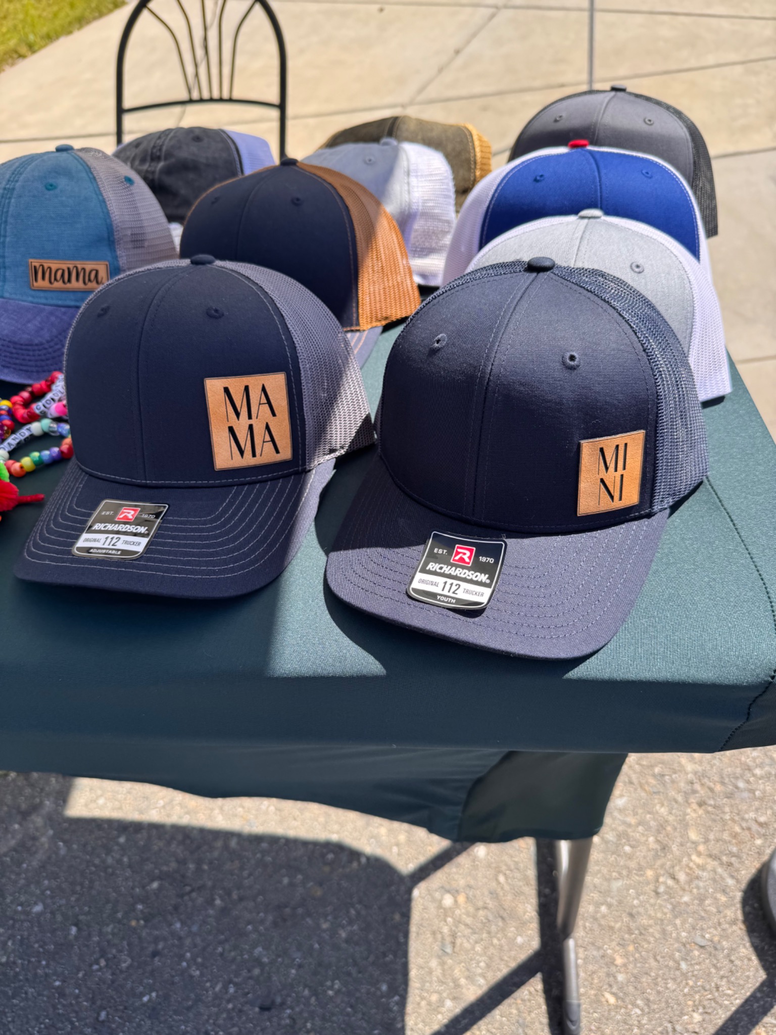 A collection of custom Five Little Chicks hats